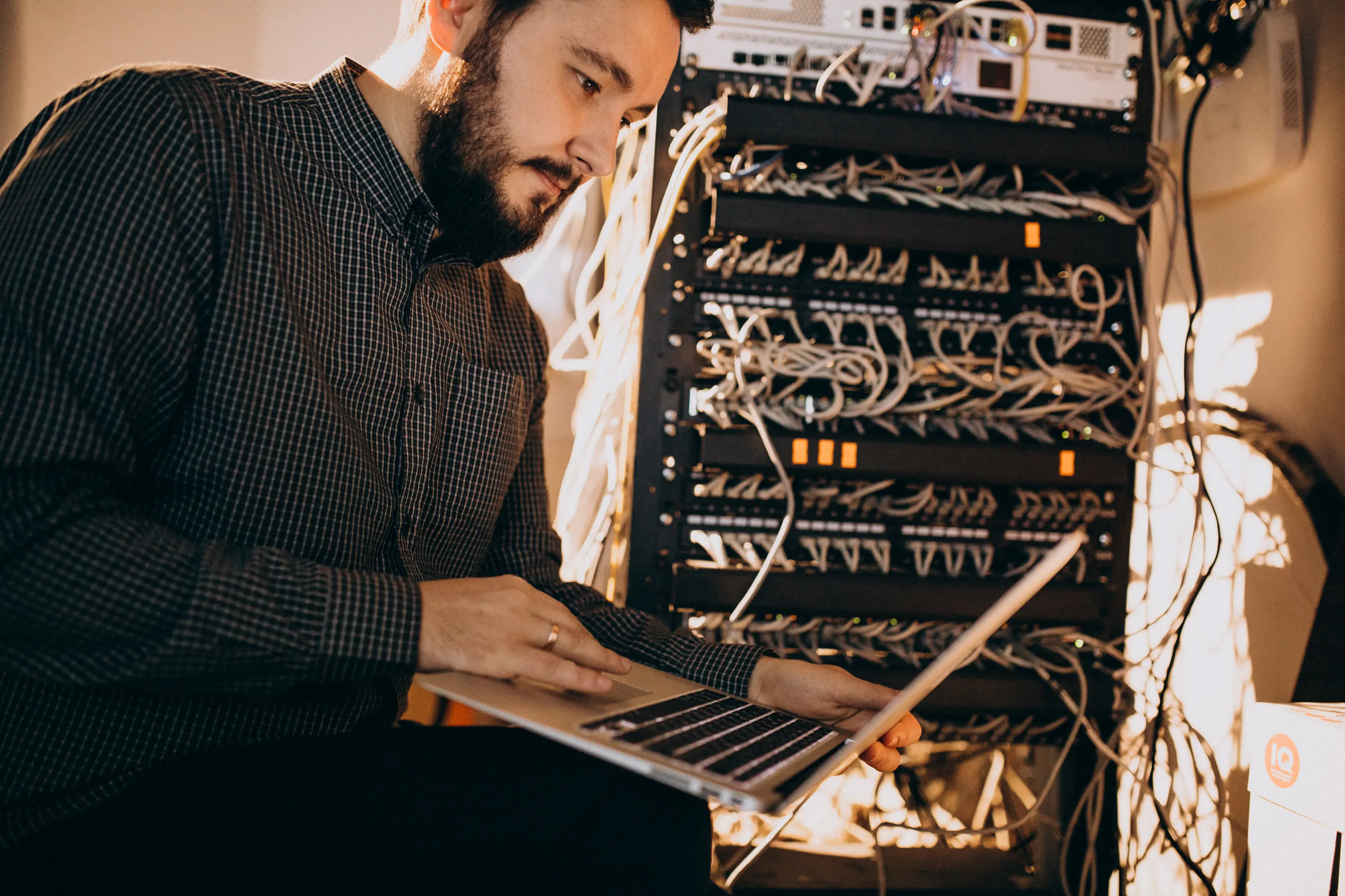 IT service technician repairing computer